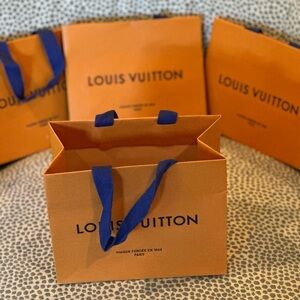 FOUR (4) Louis Vuitton gift bags
